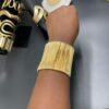 Bracelet Manchette Fils Dorés Élégance